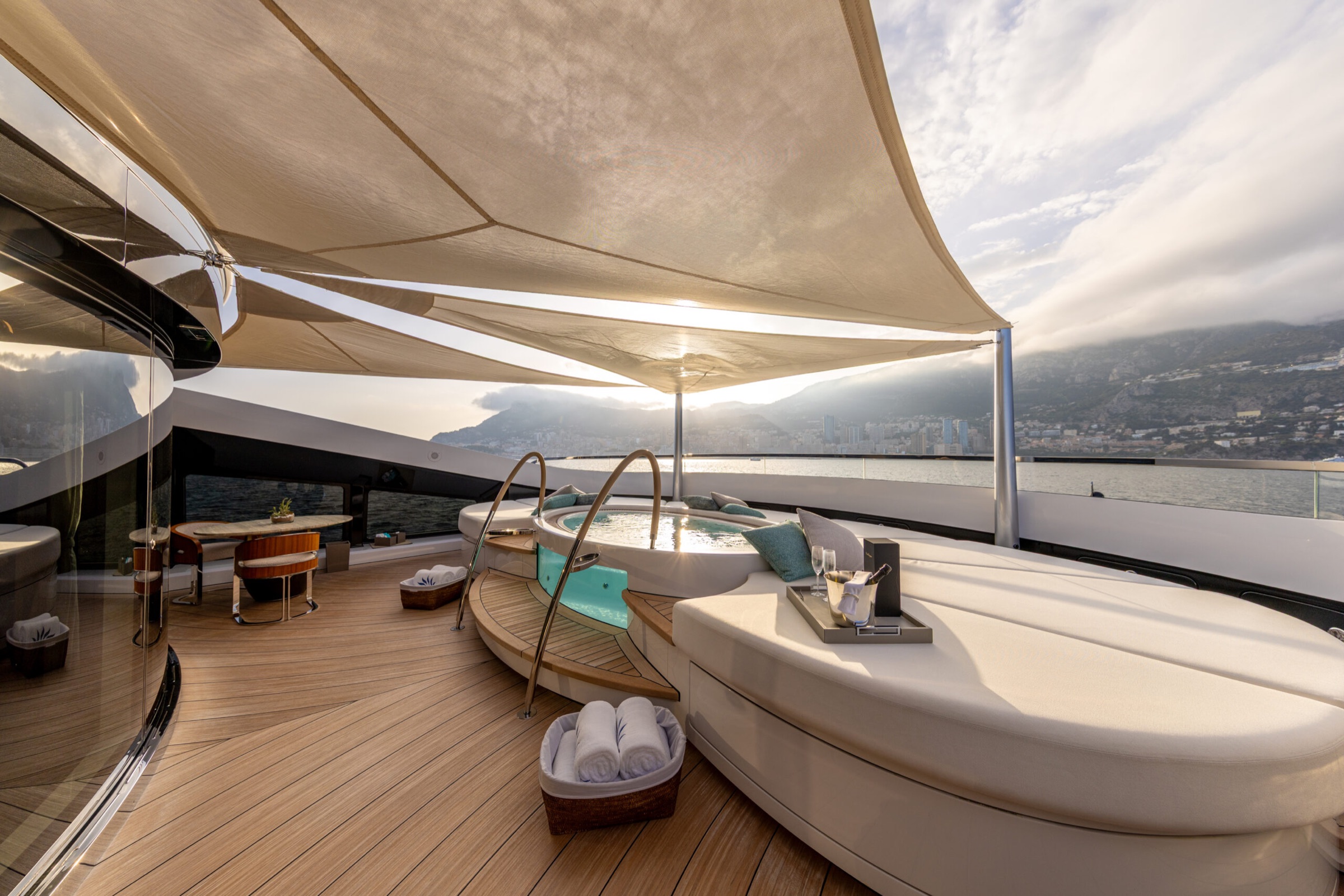Jacuzzi and sunpads on a shaded deck