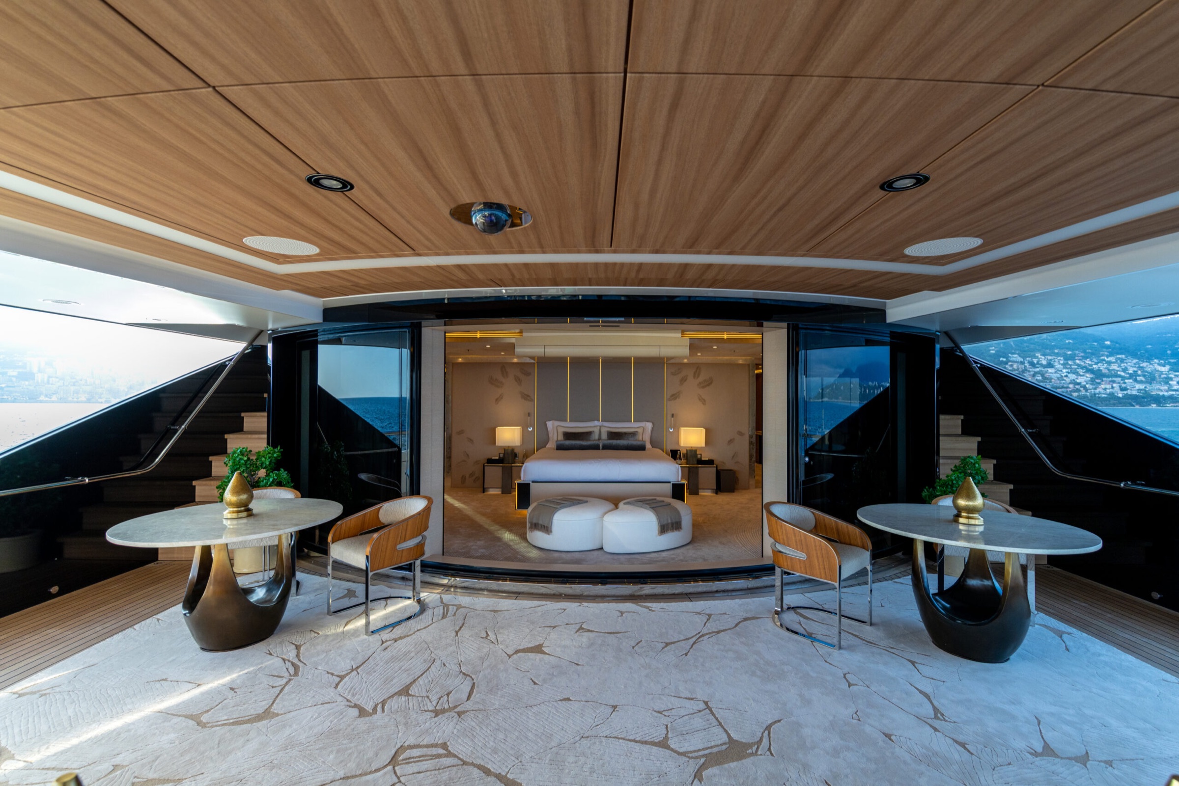 A suite opening onto the deck through glass doors