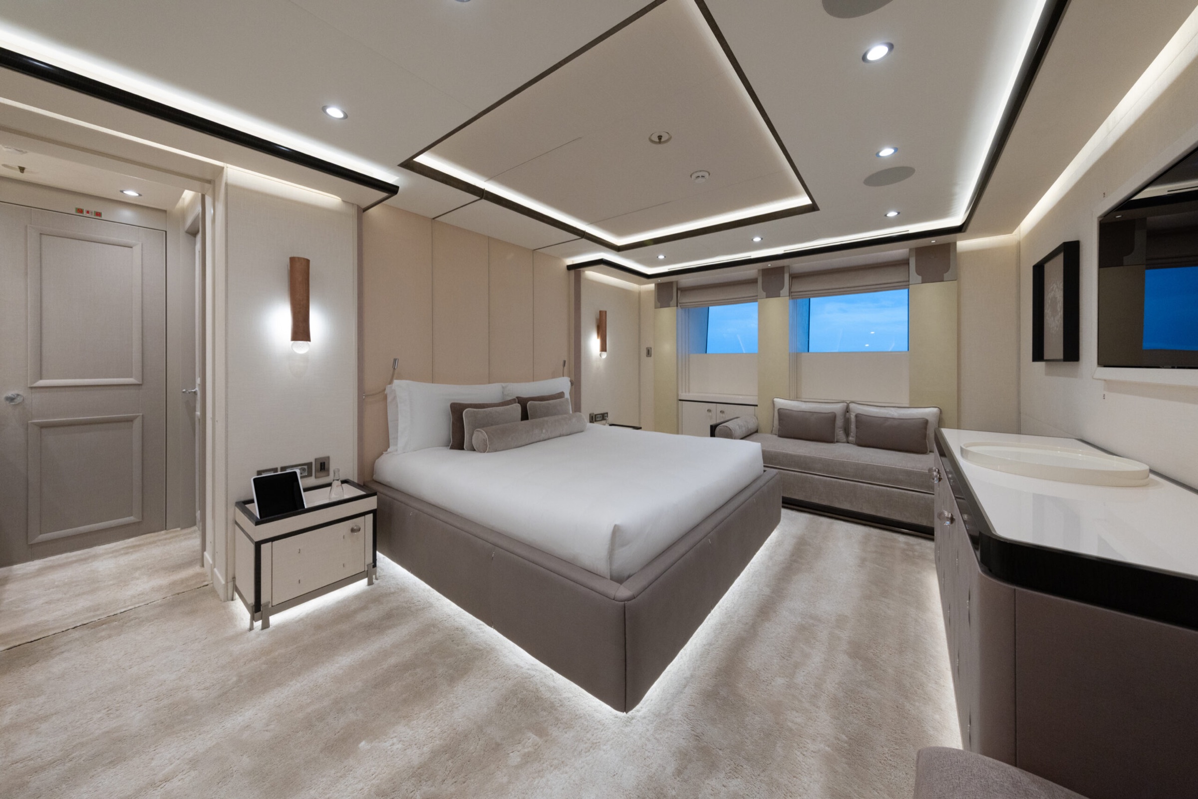 Guest cabin with a double bed and sofa